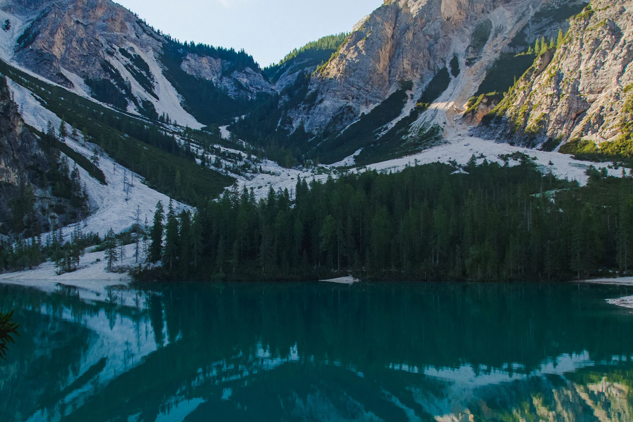 Mountain landscape reflected in a clear alpine lake
